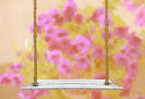 Table with blurred flowers Stock Photos