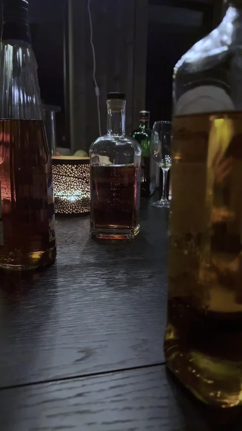 Table with bottles Stock Footage 301819123