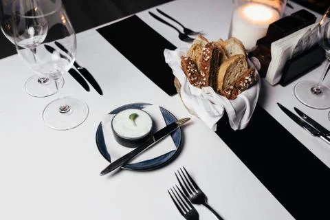 Table with bread in the restaurant Stock Photos