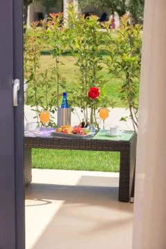 Table with breakfast in a garden Stock Photos