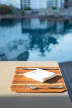 Table breakfast by the swimming pool Stock Photos