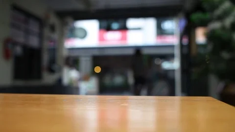 On the table at cafe blurred background Stock Footage 77268572
