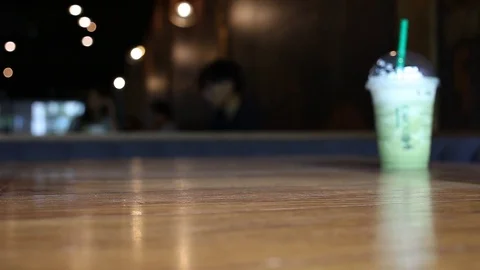 On the table at cafe blurred background Stock Footage 77762080