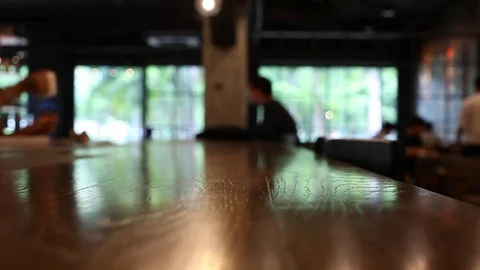 On the table at cafe blurred background Stock Footage 77763329