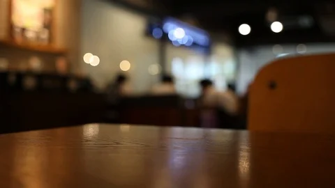 On the table at cafe blurred background Stock Footage 77763441
