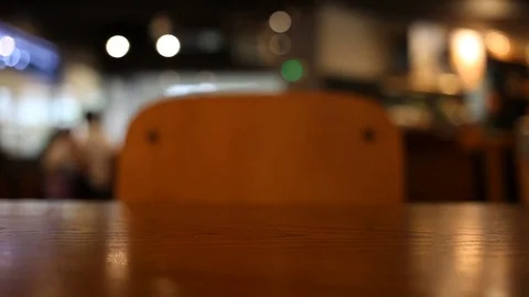 On the table at cafe blurred background Stock Footage 77763554