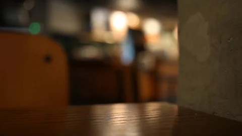 On the table at cafe blurred background Stock Footage 77763721