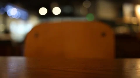 On the table at cafe blurred background Stock Footage 77763726