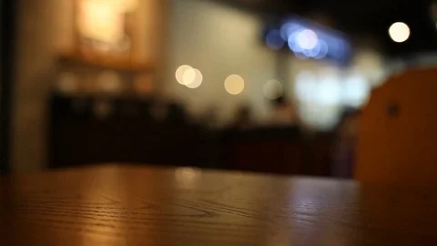 On the table at cafe blurred background Stock Footage 77763739