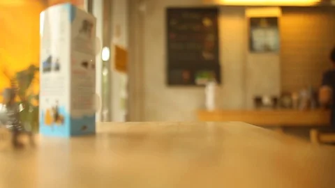 On the table at cafe blurred background Stock Footage 78038059