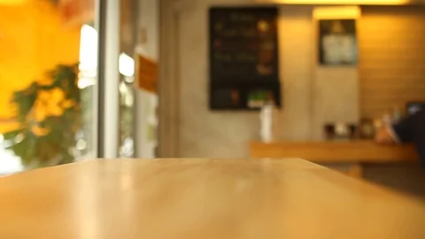 On the table at cafe blurred background Stock Footage 78038171