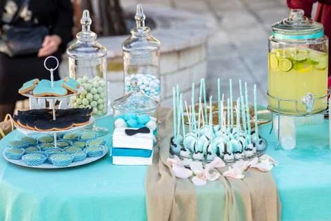 Table with cakes for the baptism Stock Photos