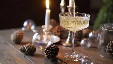 Table with candle served for Christmas dinner Stock Footage 163759424