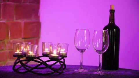 Table candles wine glasses Stock Footage 144060660