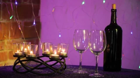 Table candles wine glasses Stock Footage 144060804