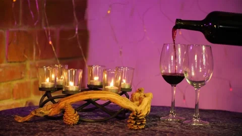 Table candles wine glasses Stock Footage 144061311