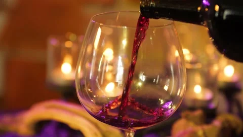 Table candles wine glasses Video stock 144064092