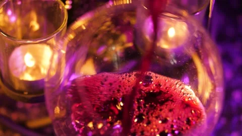 Table candles wine glasses Stock Footage 144065790