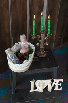 Table with candlestick. Stock Photos