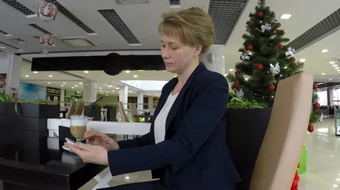 On the table is a cappuccino. Video stock 58685053