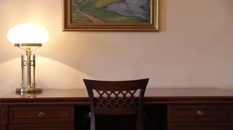 Table with chair and lamp in dormitory Stock Footage 62314568