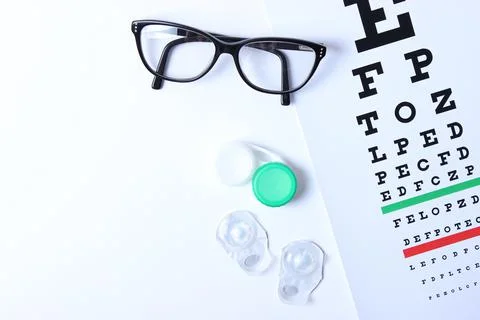 Table for checking vision, glasses and lenses for correcting vision Fotos Stock