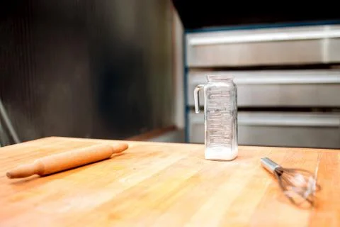 Table of the chef with rolling pin and products Stock Photos