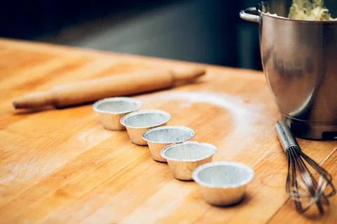 Table of the chef with rolling pin and products Stock-Fotos