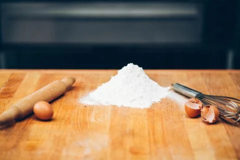 Table of the chef with rolling pin and products Stock Photos