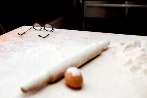 Table of the chef with rolling pin and products Stock Photos