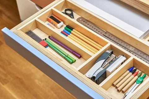 Table for children with multi-colored drawers for stationery Stock Photos