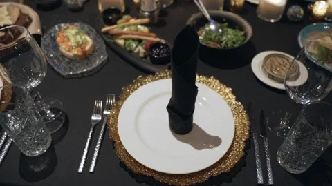 Table with Christmas decorations. Served table with food and decorations for Stock Footage 172388805