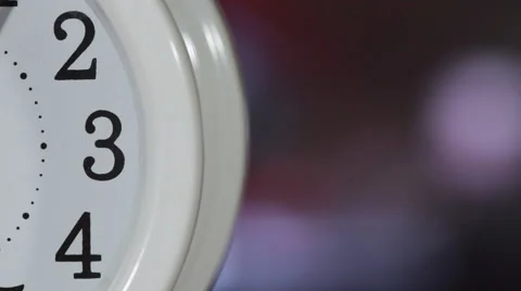 Table clock timelapse with television at the background Stock Footage 59086409