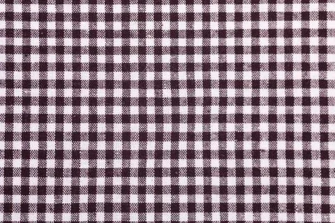 Table cloth with brown grids Stock Photos