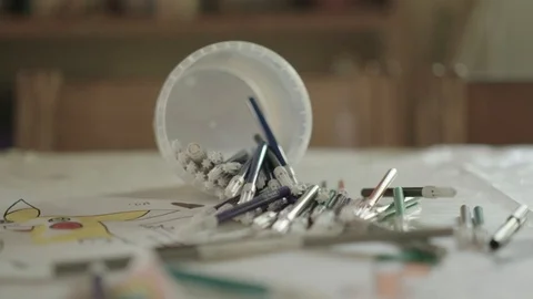 Table with colors in an empty kindergarten Stock Footage 115764711