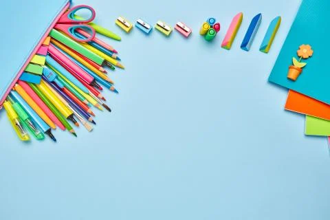 On the table is a composition from school stationery Stock Photos