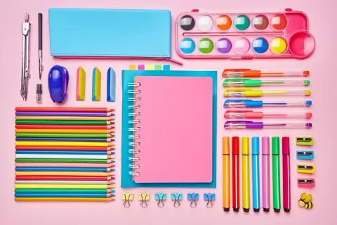 On the table is a composition from school stationery Stock Photos