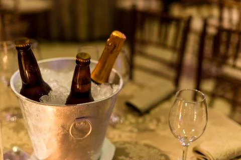 Table with container to keep ice-cold drinks for event Stock Photos