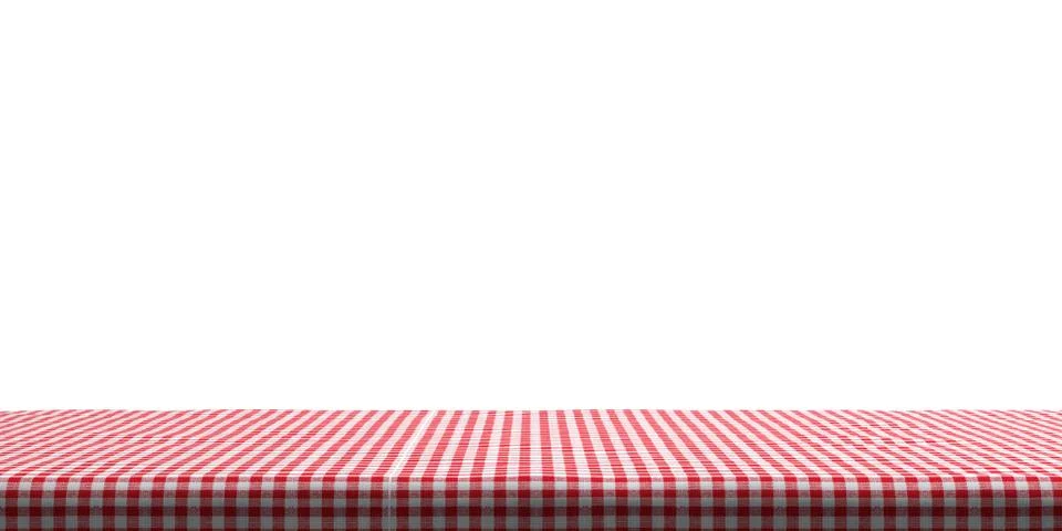 Table covered with red checkered tablecloth on white wall background, copy sp Illustrazione stock