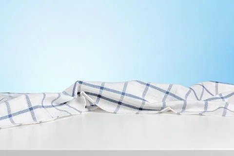 Table covered with tablecloth. Stock Photos