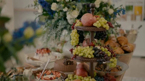 A table with cows, desserts and pastries. Stock Footage 233966966