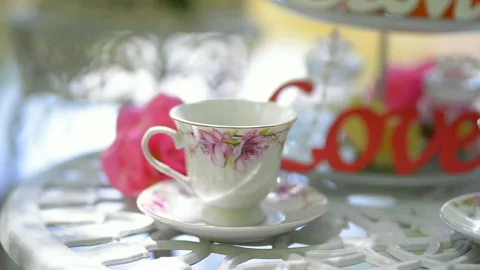 Table with crockery cups plates decorative wedding entourage Stock Footage 222297156