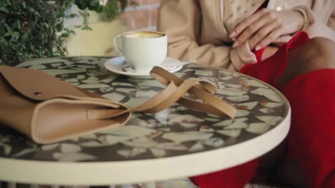 On the table is a cup of coffee Stock Footage 132960745