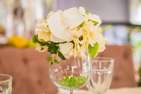 Table decor flowers in restaurant Stock Photos
