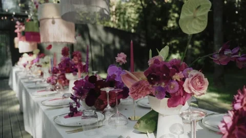 Table decorated with colourful and bright flowers for wedding Stock Footage 232485502