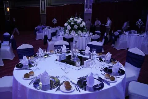 Table decorated with fresh flowers Stock Photos