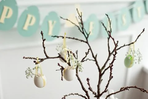 Table decoration with champagne for a festive easter dinner Stock Photos