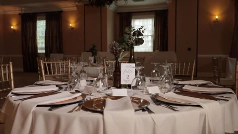 Table decorations for wedding reception dimly lit Stock Footage 129039509