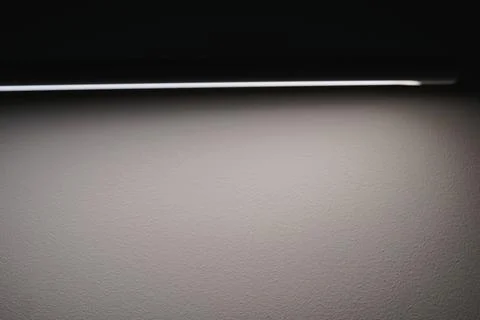 Table desk lamp white light shade darkness office remote work from home study Stock Photos