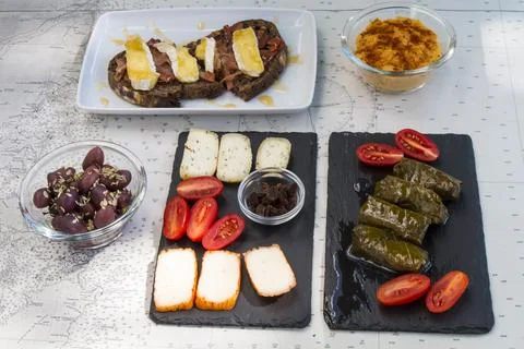 Table with different plates. Tasty different cheese, italian bruschetta with  Foto stock